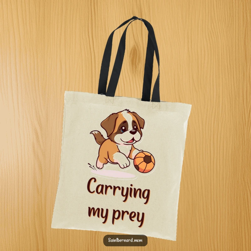 Funny Kawaii Saint Bernard tote bag of a dog with a determined look, chasing a rolling ball, ideal for carrying items with playful focus.