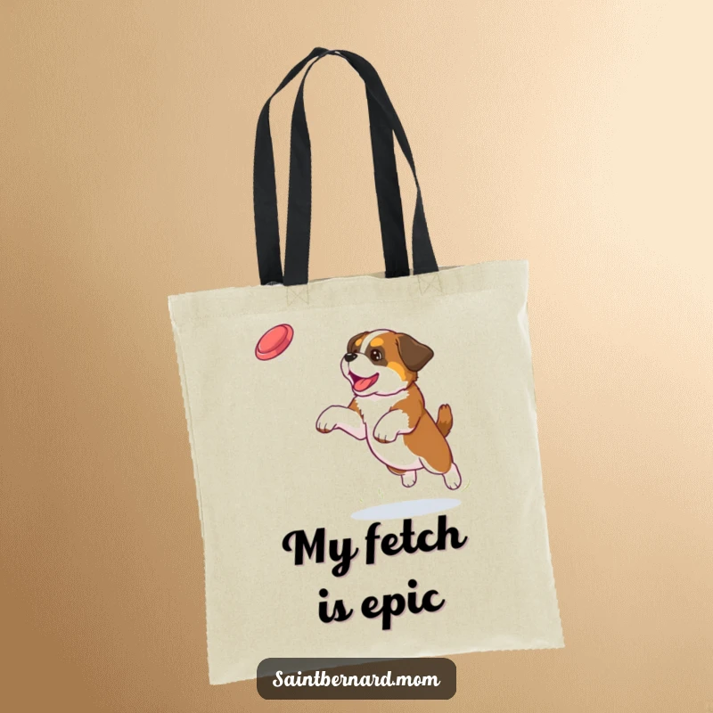 Funny Saint Bernard puppy tote bag featuring a happy dog catching a frisbee mid-air, perfect for dog moms and dads.